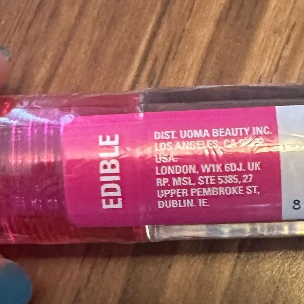 Sharon C Uoma edible lipgloss brown made in Italy